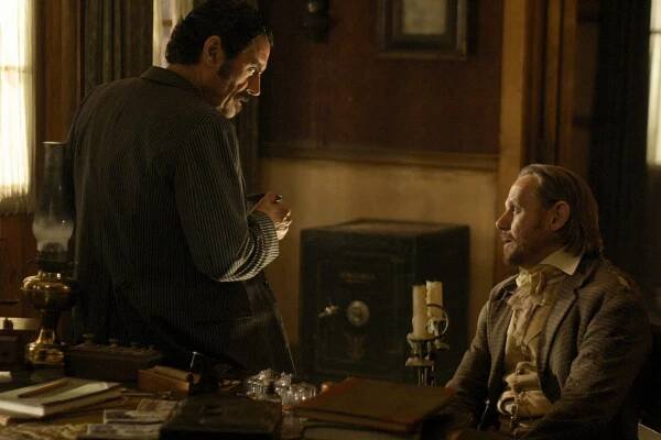 Ian McShane, William Sanderson