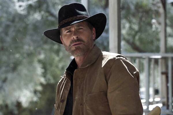 Watch Rob Lowe trade fire fighting for wood chopping in '9-1-1: Lone Star' season 3 exclusive clip