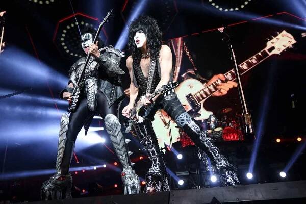 Bass guitarist Tommy Thayer and Paul Stanley f US rock band Kiss perform on stage at the Movistar Arena in Bogota on May 7, 2022