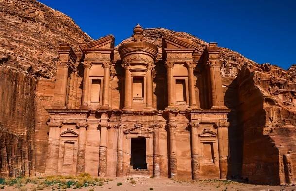 The Monastery glows in the afternoon light in Petra