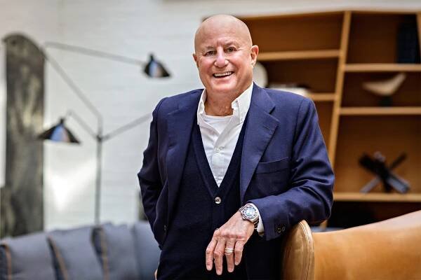 Image may contain Ronald Perelman Human Person Clothing Suit Overcoat Apparel and Coat