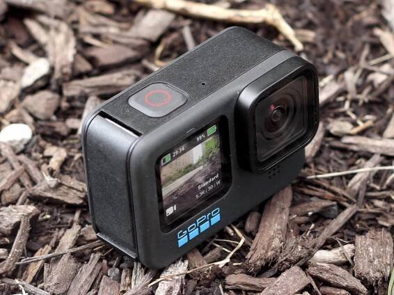GoPro Hero 11 Black angled with its front lens and display shown