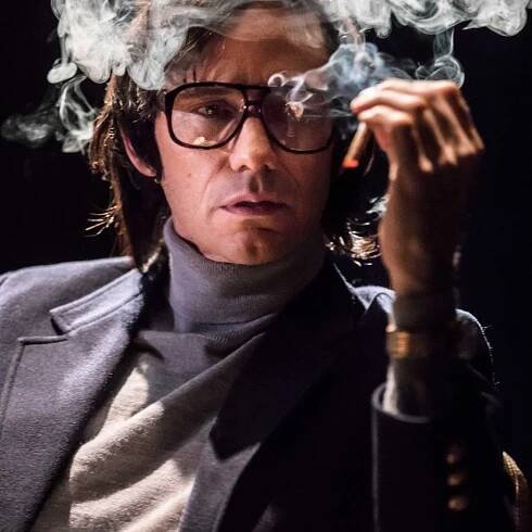 Christian Camargo in The Kid Stays in the Picture directed by Simon McBurney. (Photo: Johan Persson)
