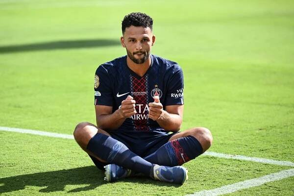 Gonzalo Ramos of Paris Saint-Germain sitting on the field.
