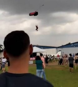 A parachutist lost control of his equipment and hurtled into a designated public area during an air acrobatics event