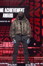 Kanye West on stage at the 2022 BET Awards.