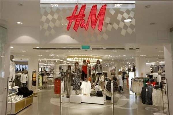 The company logo is placed at the flagship store of H&M, Hennes & Mauritz, HMb.ST, the world's second-biggest fashion retailer is seen in Stockholm