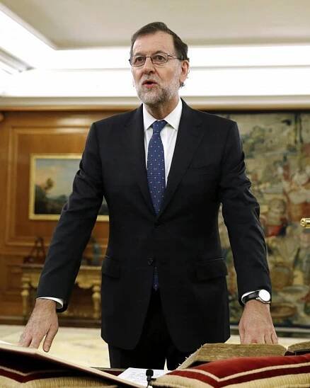Cabinet reshaped by Spain's Rajoy draws strong opposition criticism