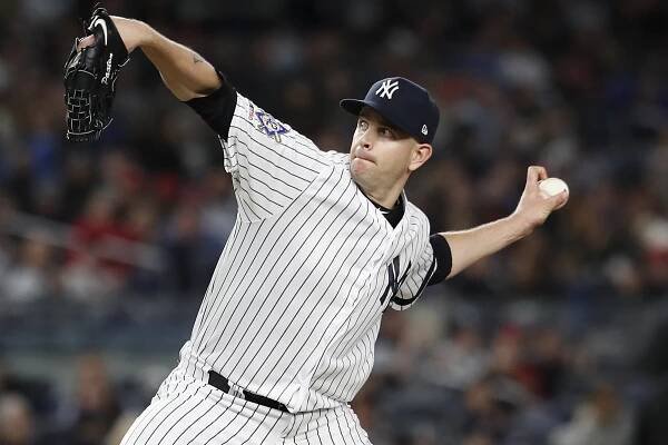 James Paxton deals to the Red Sox at the Stadium on Tuesday night during the Yankees' 8-0 win.