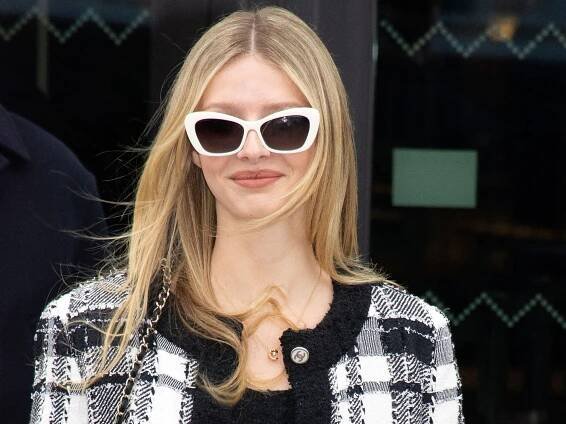 Apple Martin wears white sunglasses