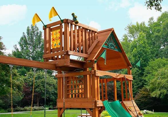 Lifestyle image of the Sky Loft/crow's nest addition to your Gorilla Playset swing set.