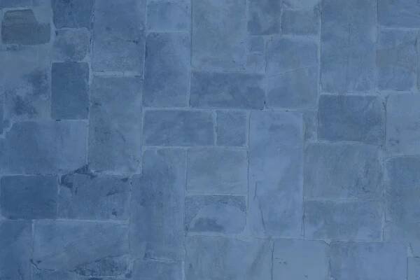 Stone pation with blue overlay for Bluestone Landscaping branding