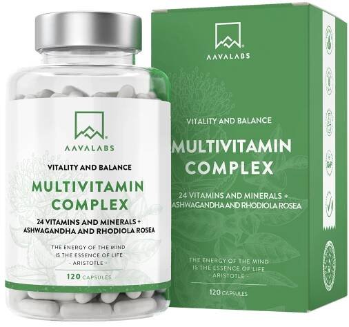 White multivitamin capsule bottle with silver lid beside green box packaging on pale background – Multivitamin Aavalabs