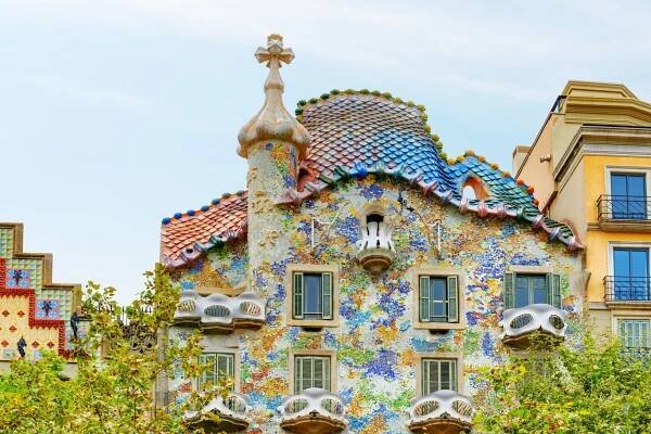 Close-up view of the colorful façade of Casa Batlló, a famous modernist building designed by Antoni Gaudí in Barcelona.