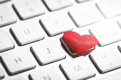 Free photo heart on the keyboard of a computer