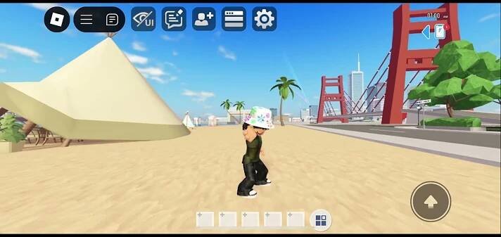 Roblox avatar on a beach near a bridge.