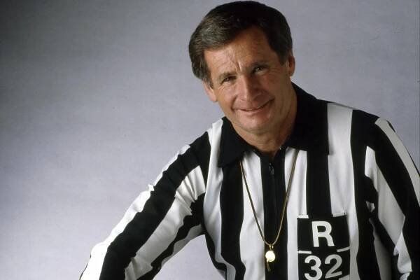 NFL referee Jim Tunney smiles for a headshot.