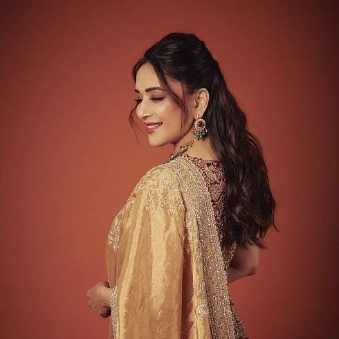 Madhuri Dixit Nene’s gold Mrunalini Rao sari + maroon waistcoat took 760 hours to complete