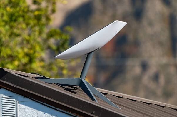 A Starlink satellite dish placed on a roof.