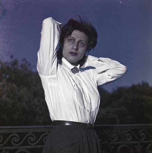 Anna Magnani Striking A Pose For Rendezvous With Anna Magnani, Wearing A White Blouse With Raised Arms, 1950S