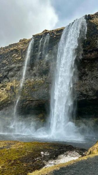 Free Stunning view of Seljalandsfoss waterfall in Iceland's scenic countryside, showcasing natural beauty. Stock Photo