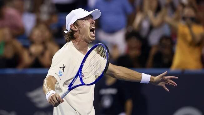 Alex de Minaur screams after winning the Washington DC Open final against Alejandro Davidovich Fokina.