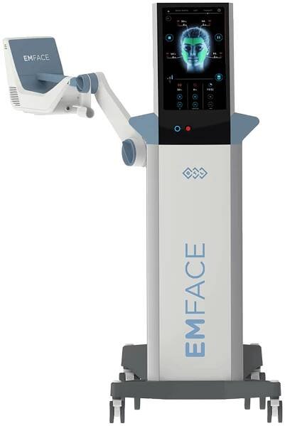 A medical device named "BTL Emface," featuring a touchscreen that displays a human face and equipped with adjustable components for facial treatments, is a multifunctional tool comparable in efficiency to a used aesthetic laser.