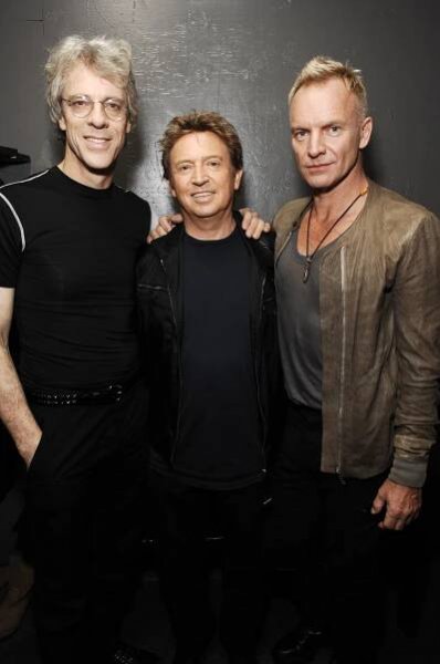 Stewart Copeland, Andy Summers, and Sting of The Police at a press conference.