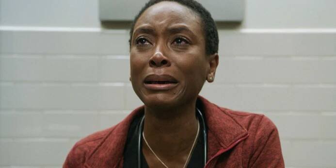 Dr. Heather Collins (Tracy Ifeachor) crying over a possible unexpected miscarriage in The Pitt Season 1 Ep 7