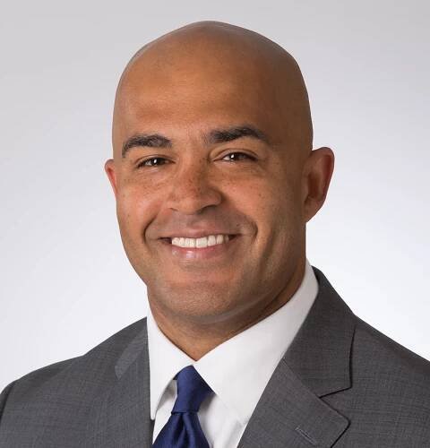 A headshot of cardiology physician Dr. Christopher Jones.