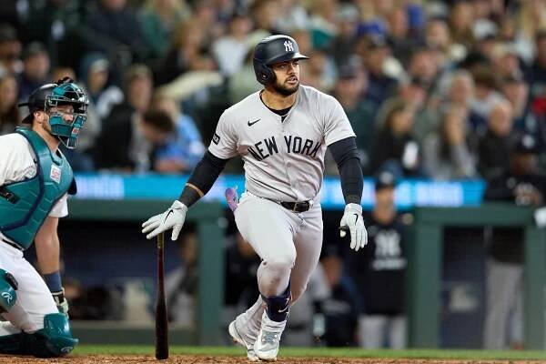 Yankees left fielder Jasson Dominguez (24) hits an RBI doube against the Seattle Mariners during the sixth inning at T-Mobile Park.