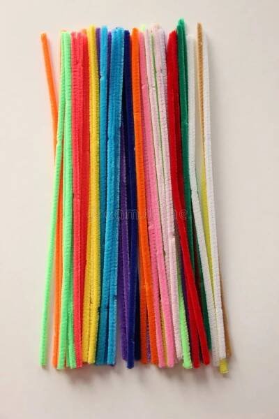 Multi colored pipe cleaners on white background. Cleaners stock images, royalty-free photos and pictures