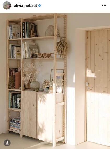 an open book shelf with books on it
