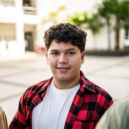 A teenager smiling
