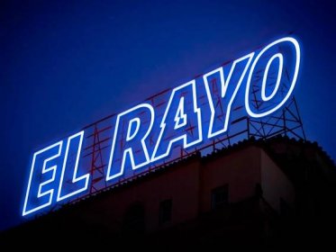 Brand identity for Almacen El Rayo, storefront neon sign