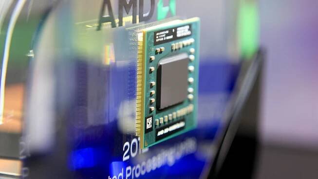 An Advanced Micro Devices Inc. AMD-A10-4600M Series APU computer chip is displayed at the AMD booth at Computex Taipei 2012 in Taipei, Taiwan, on Tuesday, June 5, 2012. Computex Taipei 2012 takes place from June 5 to June 9.