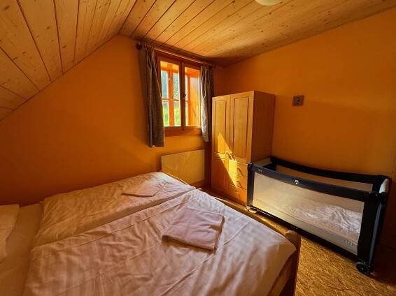 Postel nebo postele na pokoji v ubytování Apartmány Podťaté