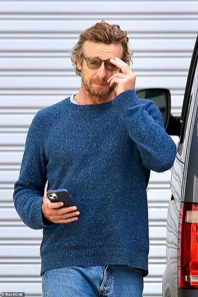 The Mentalist actor framed his face with a pair of tinted glasses and was seen texting as he stepped out during the low-key outing