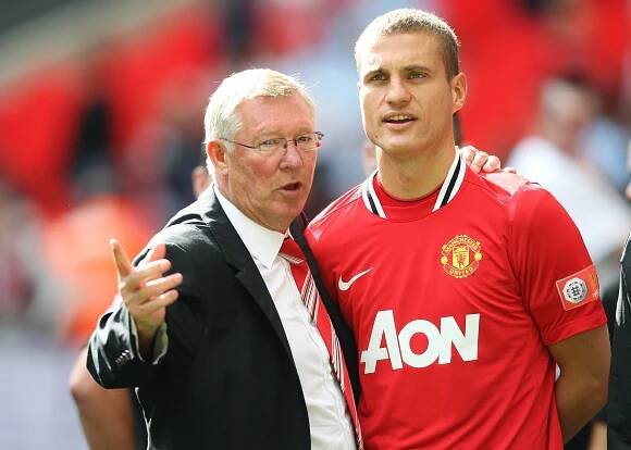 Sir Alex Ferguson and Nemanja Vidic of Manchester United.