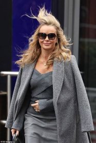 Out and about: Amanda Holden got caught in a bluster as she departed the Heart Radio studios alongside her co-host Ashley Roberts on Wednesday