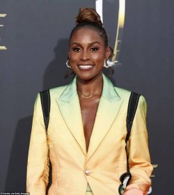 The Insecure alum, 29, impressed in a stylish single-breasted suit by CASABLANCA featuring a rainbow ombre print