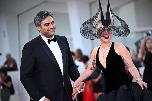 Lady Gaga and Michael Polansky attend the "Joker: Folie A Deux" photocall during the 81st Venice International Film Festival at Palazzo del Casino on September 04, 2024 in Venice, Italy.