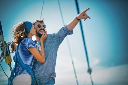 Young couple on a sailing cruise.