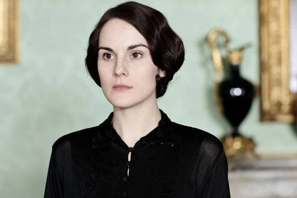 Dockery's Lady Mary must face life without her beloved husband in Season Four. Will she take a new suitor? Stay tuned.