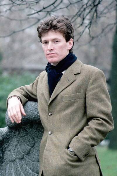 Steve Winwood Leaning on Eagle Sculpture
