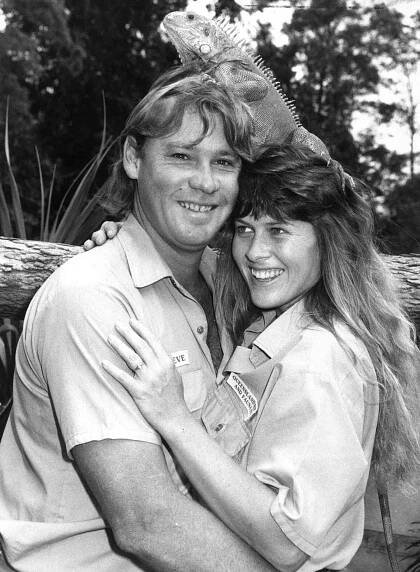 Steve Irwin and his wife, Terri Irwin, and 'Jonathon' the Green Iguana at Australia Zoo in Queensland.