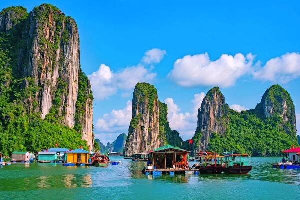 Floating village, rock island, Halong Bay, Vietnam