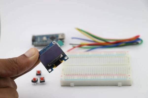 Hand showing how to use i2c arduino.
