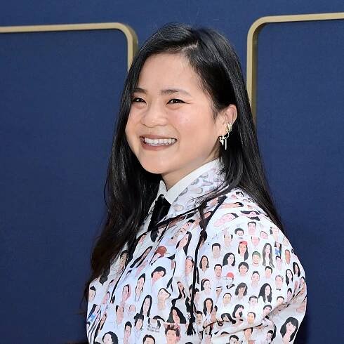 Image may contain Kelly Marie Tran Face Happy Head Person Smile Adult Dimples Accessories Formal Wear and Tie