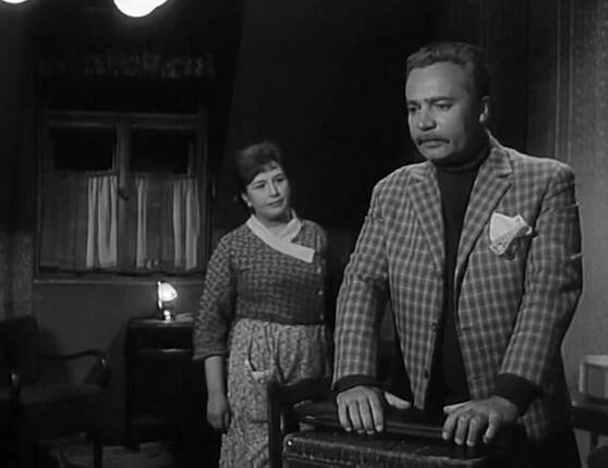 Vladimír Mensík and Stella Zázvorková in Mezi námi zlodeji (1964)